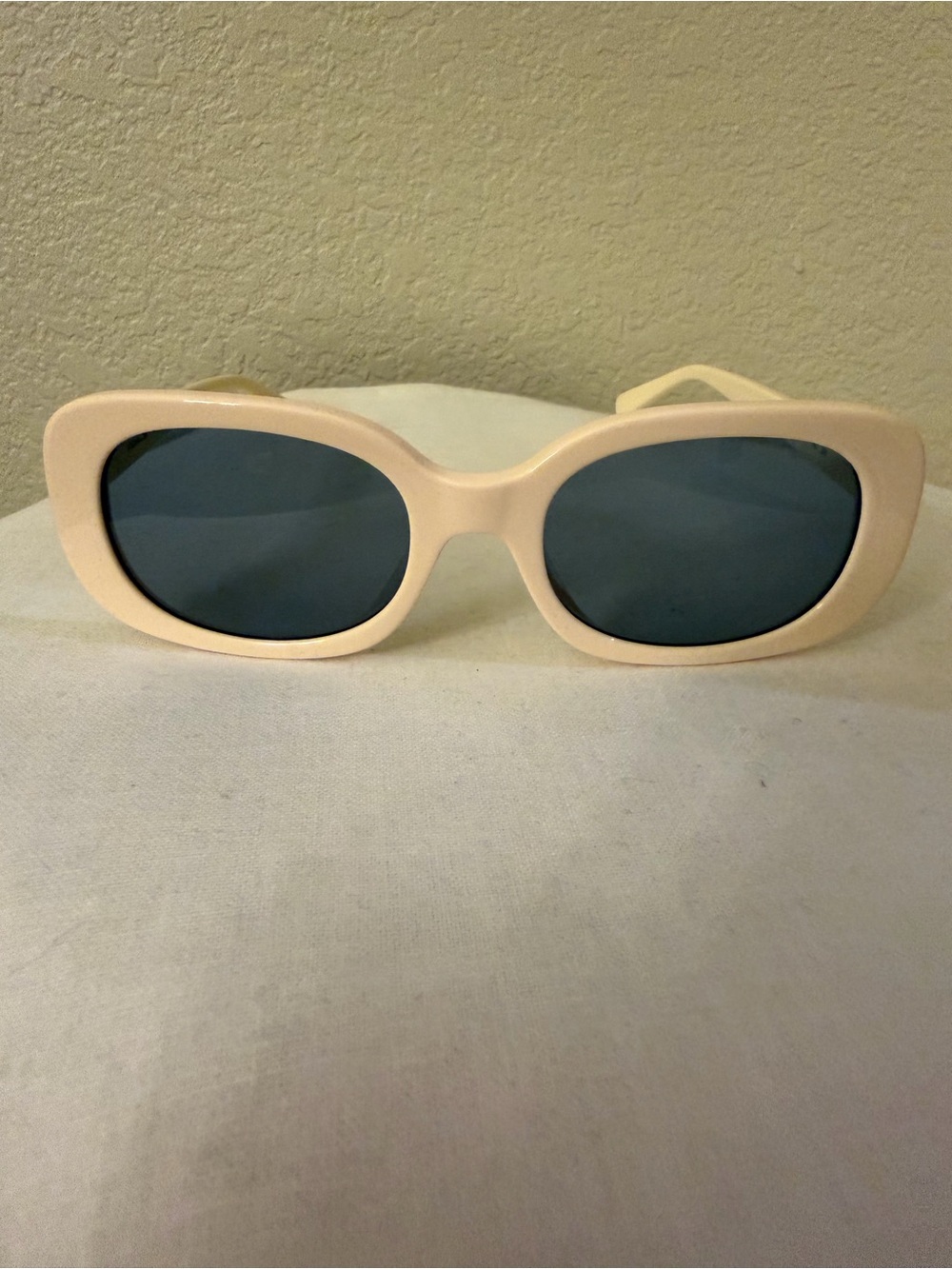Coach Cream Frame Sunglasses with Dark Blue Lenses
